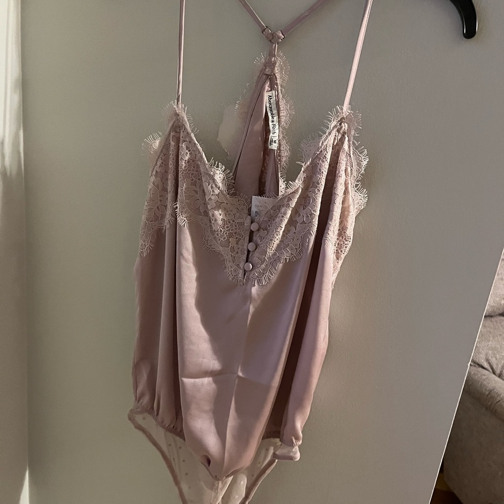 Pink bodysuit